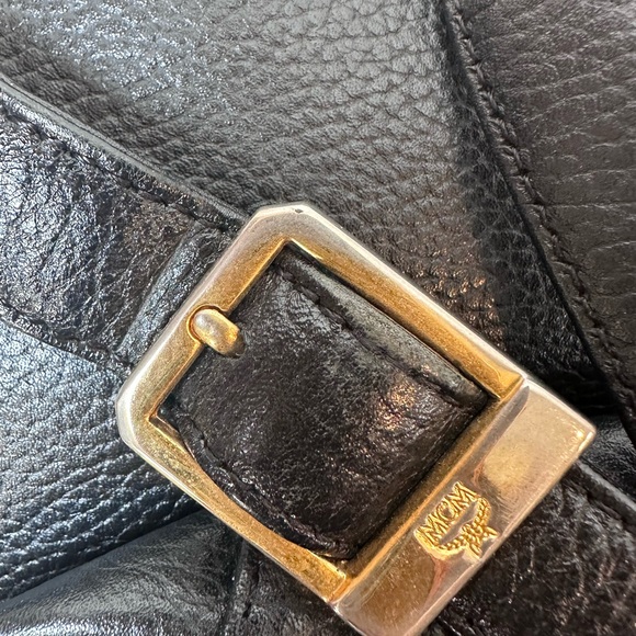 MCM Black Leather Drawstring Shoulder Backpack with Gold Accents - Picture 7 of 11